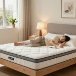 Extra firm mattress Majestic 11000 in cozy bedroom with natural light, promoting restful sleep.