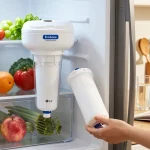 EcoAqua EFF-6005 Replacement for LG LT500P ADQ72910901 filter being installed in a bright kitchen for fresh water.